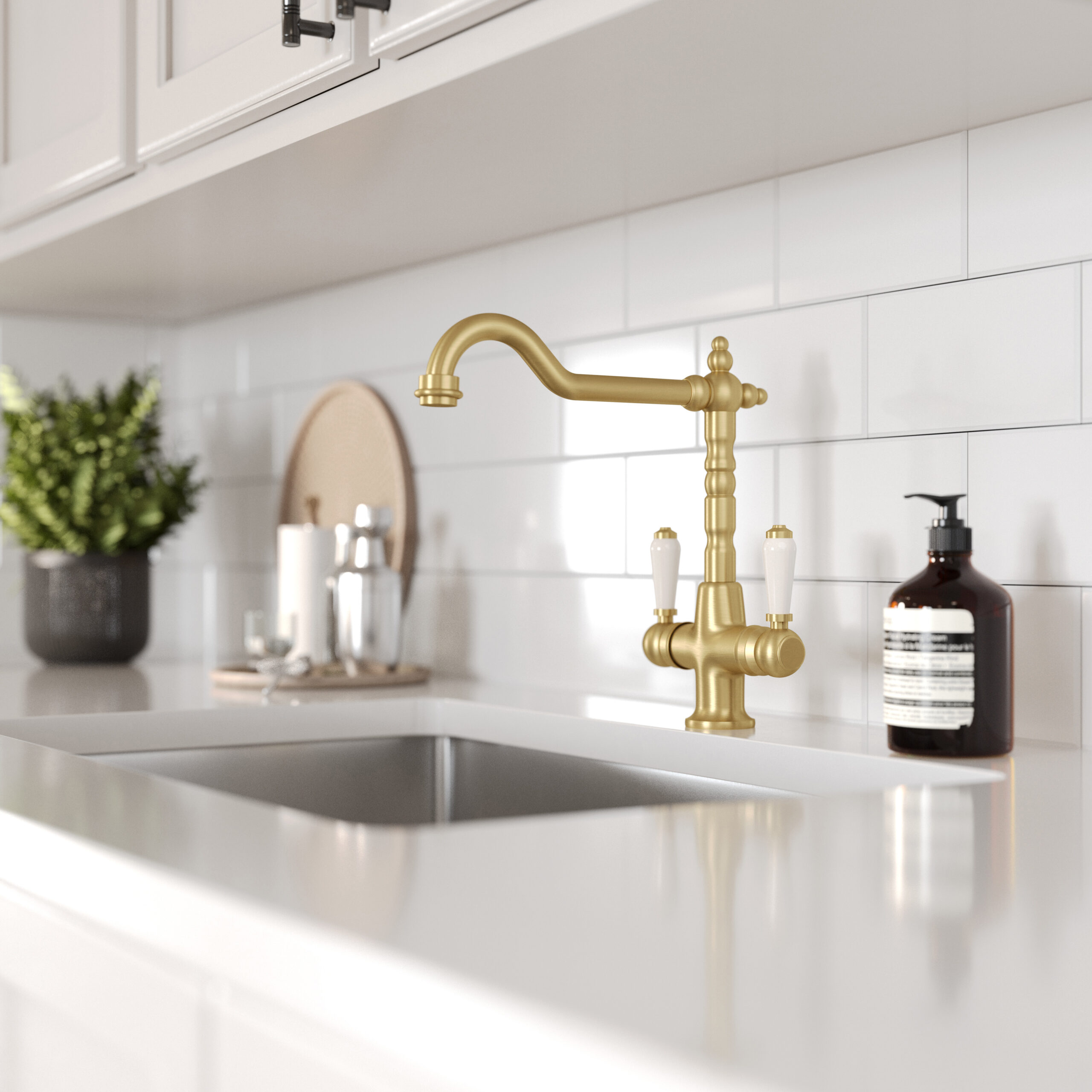 Alma brushed brass dual lever tap with white ceramic handles